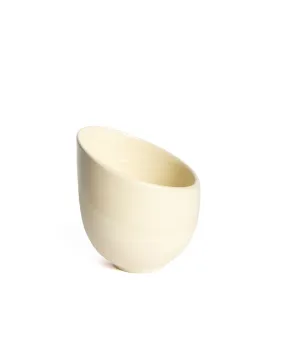 Beveled white stoneware cup