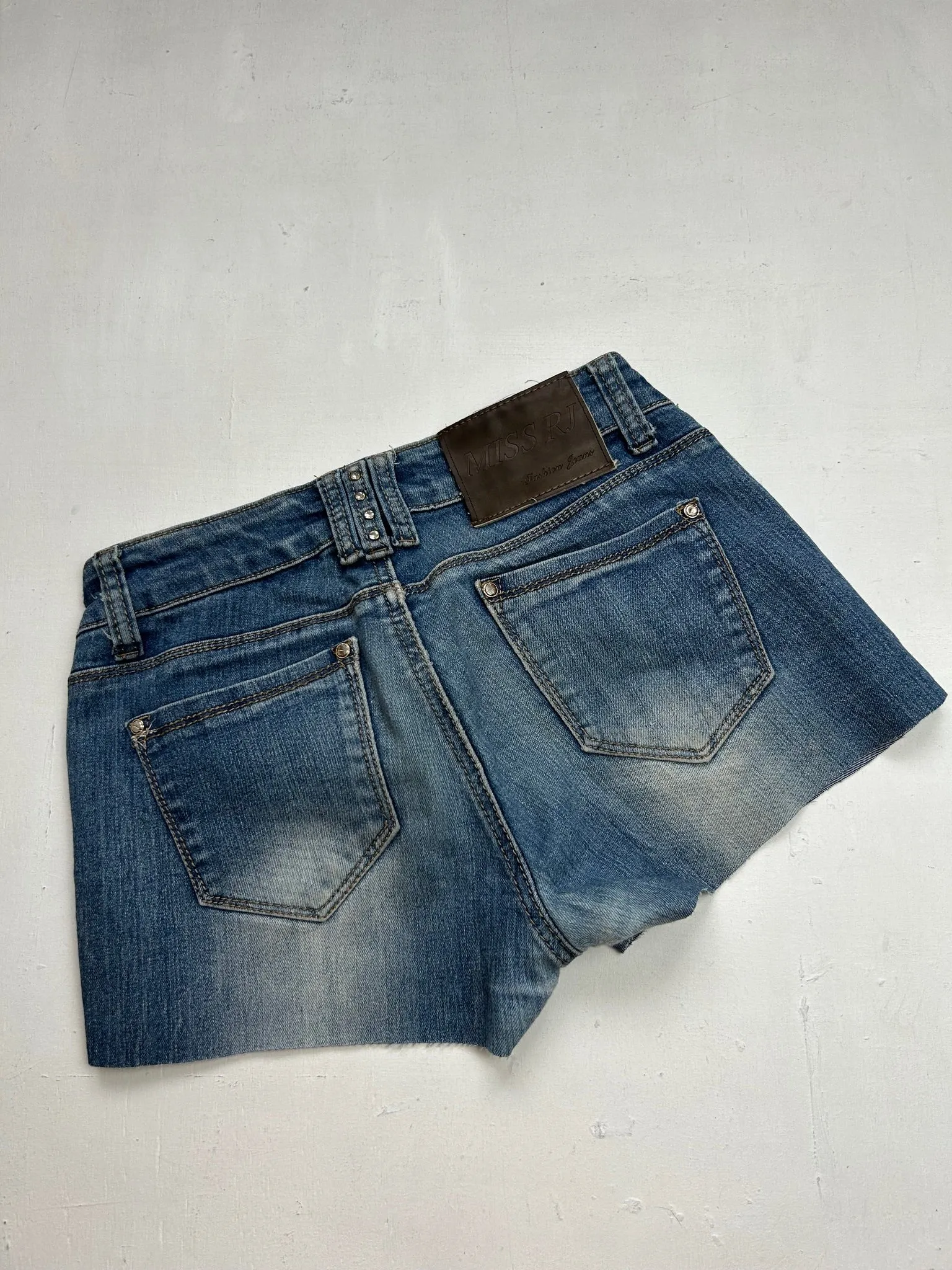 Blue low rise denim mini short (XS)